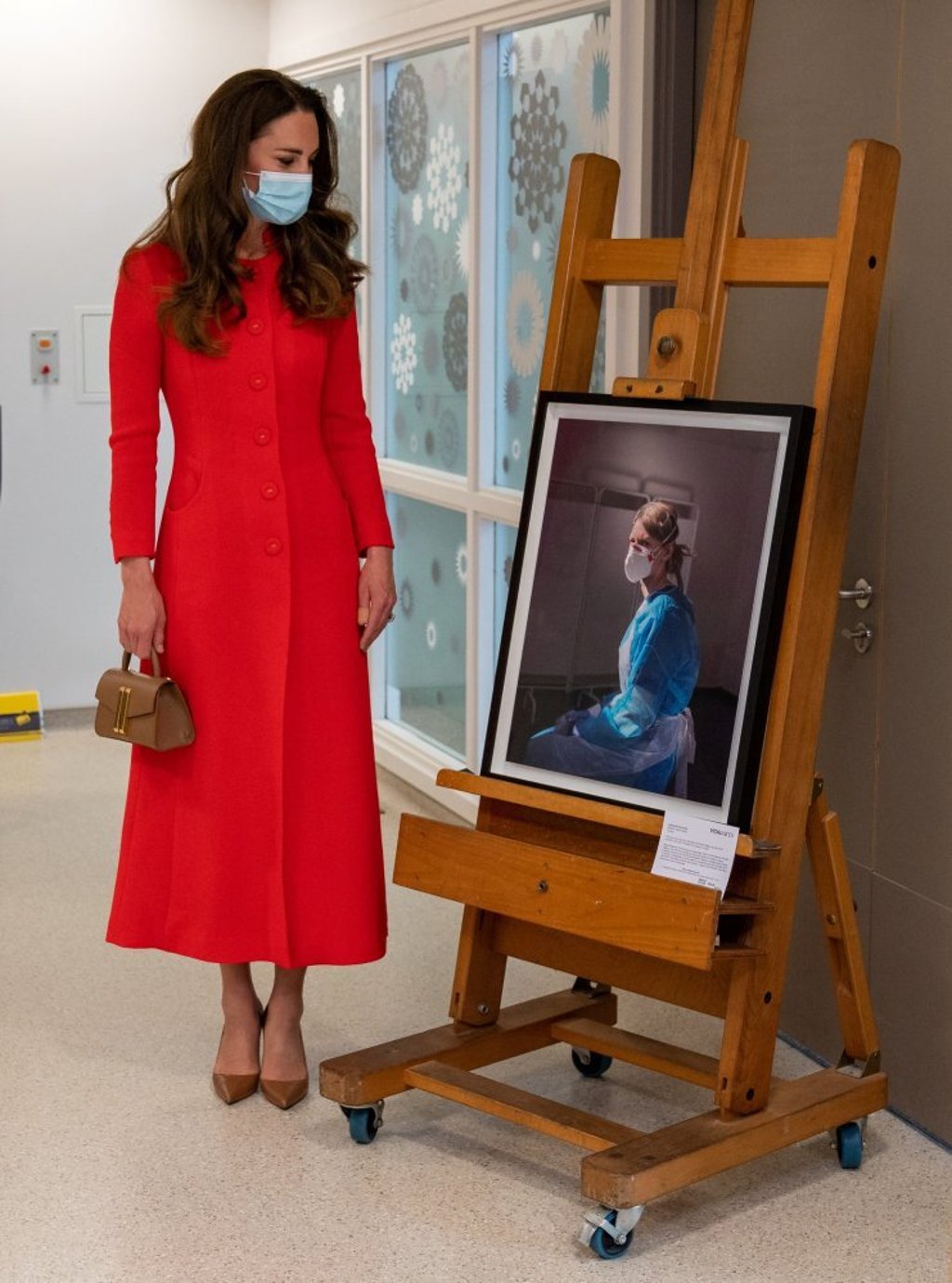 Kate Middleton, Duchess of Cambridge, dazzled in a striking red coat dress by brand Eponine London on a recent visit to the Royal London Hospital. Photo: Reuters