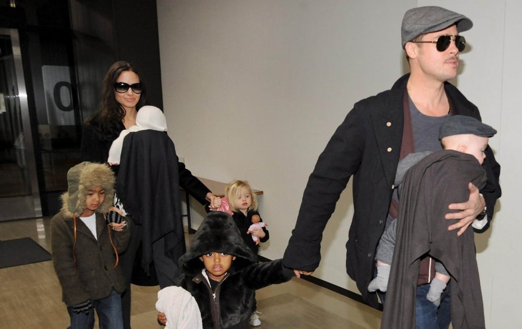 Brad Pitt with his son Knox (in arms) and daughter Zahara upon arrival in Tokyo in 2009. Behind Pitt is now ex-wife Angelina Jolie holding their daughter Vivienne, son Maddox and daughter Shiloh. Photo: EPA Brad Pitt with his son Knox (in arms) and daughter Zahara upon arrival in Tokyo in 2009. Behind Pitt is now ex-wife Angelina Jolie holding their daughter Vivienne, son Maddox and daughter Shiloh. Photo: EPA