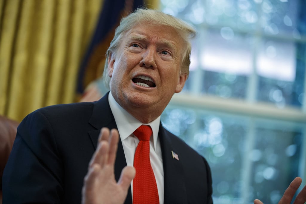 Then-president Donald Trump talks with reporters in the Oval Office of the White House in Washington in September 2019. Photo: AP Photo