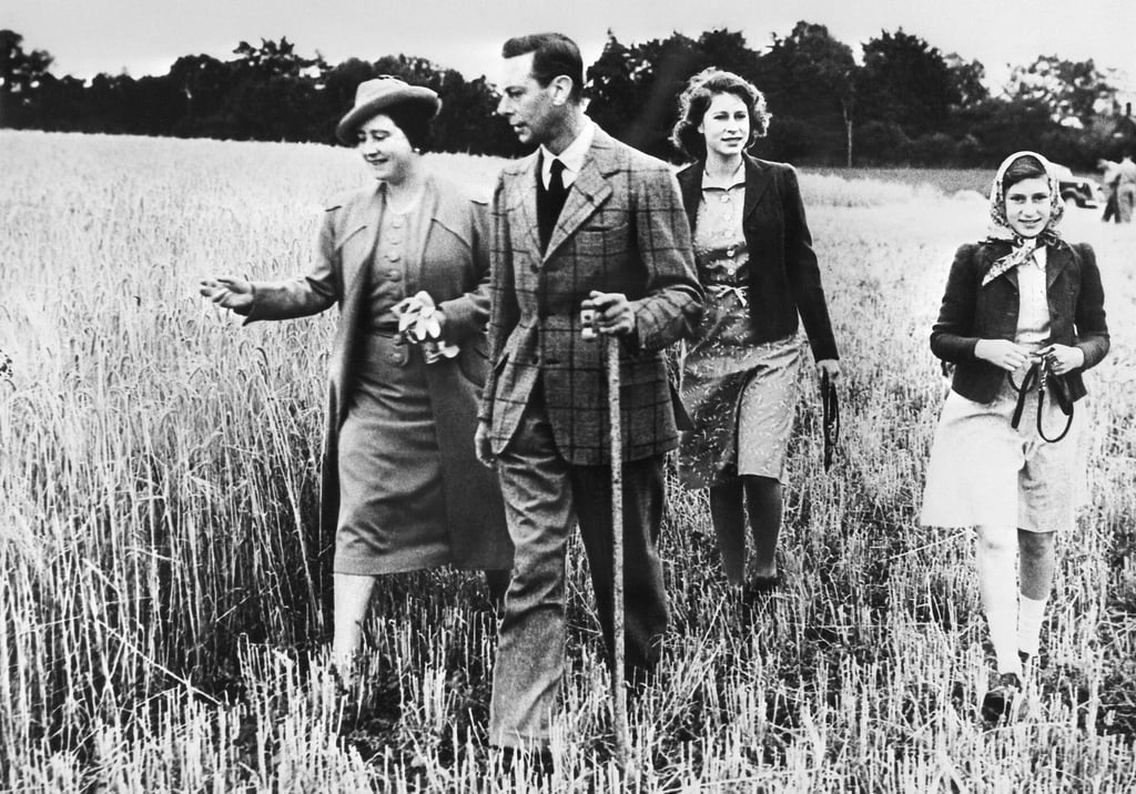 An undated picture of Princess Elizabeth of Great Britain walking with her sister Princess Margaret and their parents King George VI and Queen Elizabeth, in an unknown location.