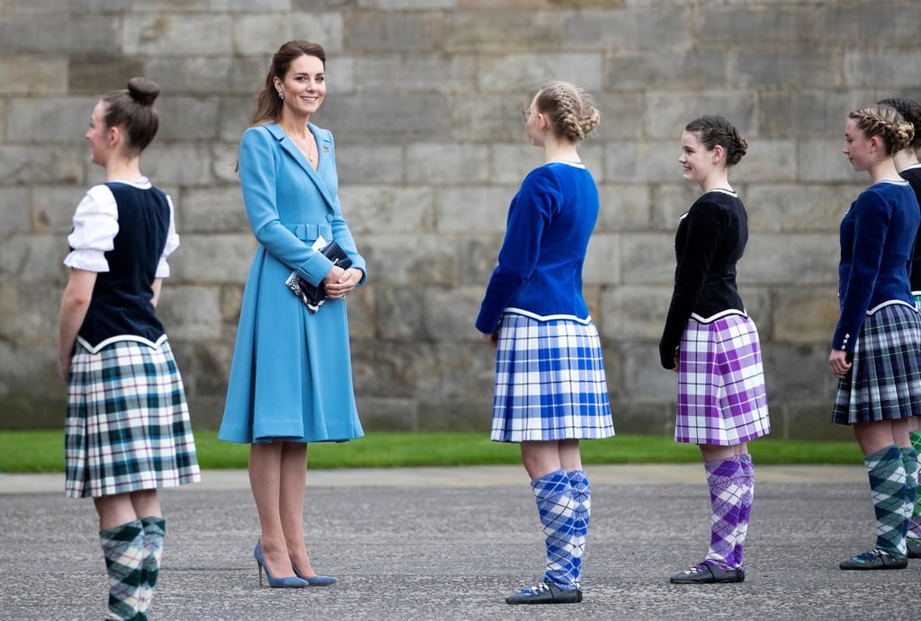 Kate Middleton’s sky blue Catherine Walker coat (and the Duchess herself) clearly lifted the spirits of young Highland dancers during an event at Holyroodhouse Palace in Scotland. Photo: Reuters