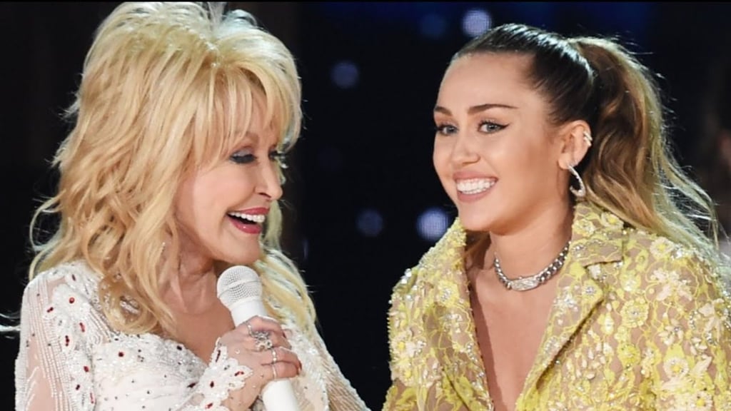 Dolly performing with goddaughter Miley Cyrus. Photo: YouTube
