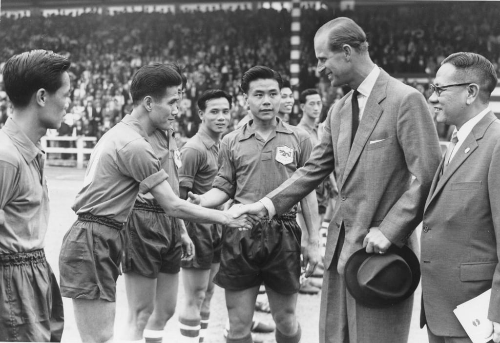 Prince Philip, Duke of Edinburgh, meeting Hong Kong footballers at the Memorial Cup final at the South China Stadium during his visit to Hong Kong in 1959. Photo: SCMP