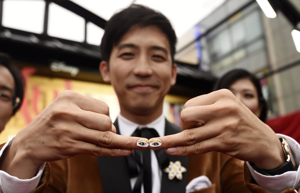 Jimmy Wong shows off his quirky nail art at the LA premier of Mulan in March 2020. Photo: AP Jimmy Wong shows off his quirky nail art at the LA premier of Mulan in March 2020. Photo: AP