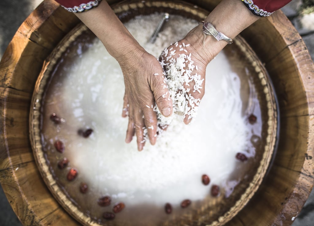 A resident washes polished glutinous rice at home in Zigui County of central China’s Hubei Province. Photo: Xinhua A resident washes polished glutinous rice at home in Zigui County of central China’s Hubei Province. Photo: Xinhua