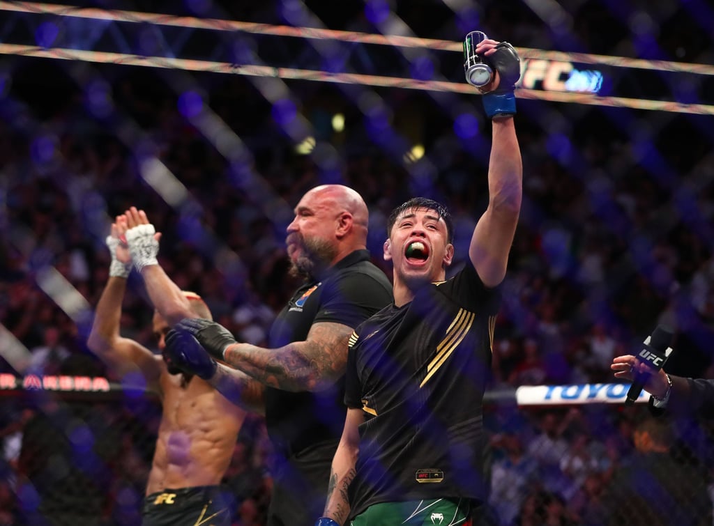 Brandon Moreno celebrates after beating Deiveson Figueiredo via submission at UFC 263 at the Gila River Arena in Arizona in June. Photo: USA Today