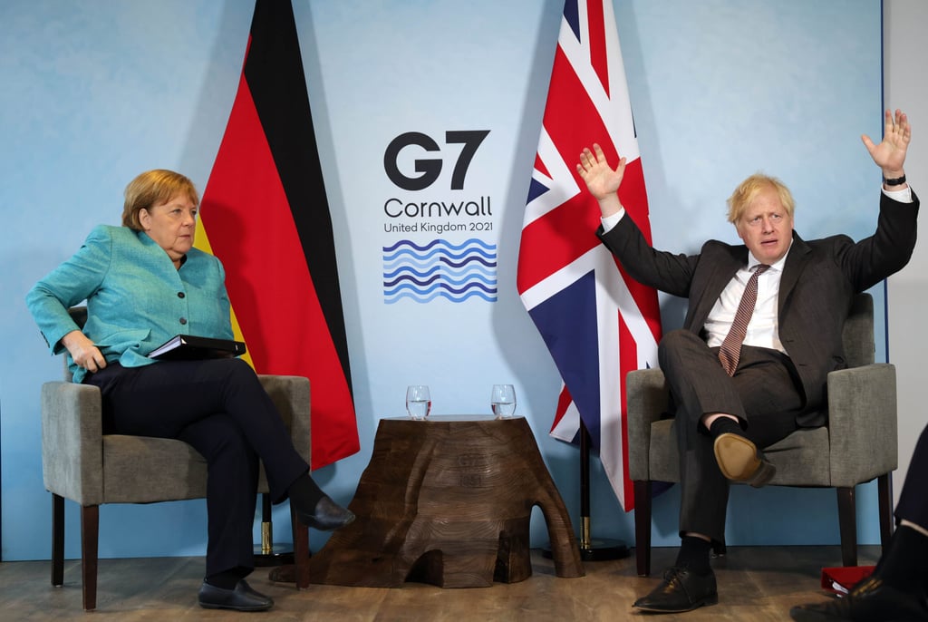 British Prime Minister Boris Johnson and German Chancellor Angela Merkel at the G7 summit in Cornwall, UK on Saturday. Photo: No10 Downing Street / DPA British Prime Minister Boris Johnson and German Chancellor Angela Merkel at the G7 summit in Cornwall, UK on Saturday. Photo: No10 Downing Street / DPA