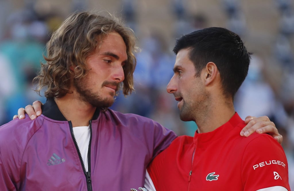 Serbia’s Novak Djokovic, right, with Greece’s Stefanos Tsitsipas after their final at the Roland Garros stadium in Paris on Sunday. Photo: Reuters
