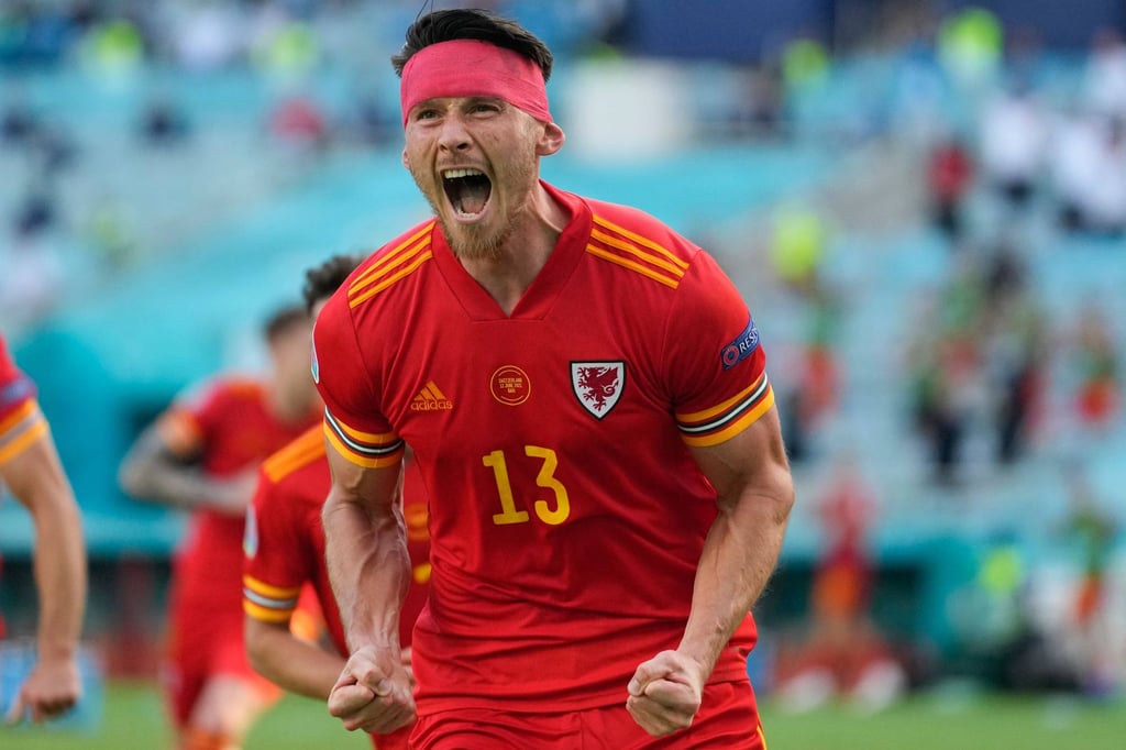 Wales forward Kieffer Moore celebrates his goal during against Switzerland. Photo: AFP