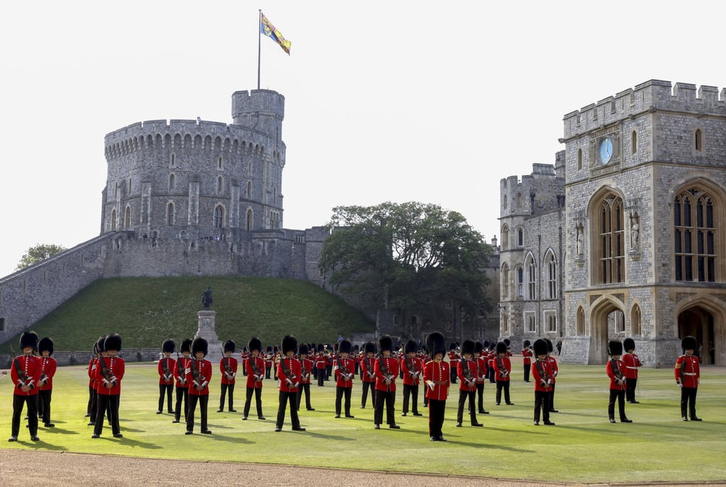 Soldiers of the queen’s Company First Battalion Grenadier Guards in the quadrangle of Windsor Castle in England on Sunday. Photo: AP Soldiers of the queen’s Company First Battalion Grenadier Guards in the quadrangle of Windsor Castle in England on Sunday. Photo: AP