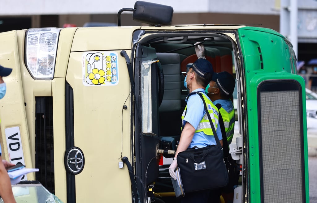 A 57-year-old minibus driver died and 6 passengers and the driver of a car were hurt in the Sha Tin crash. Photo: May Tse A 57-year-old minibus driver died and 6 passengers and the driver of a car were hurt in the Sha Tin crash. Photo: May Tse