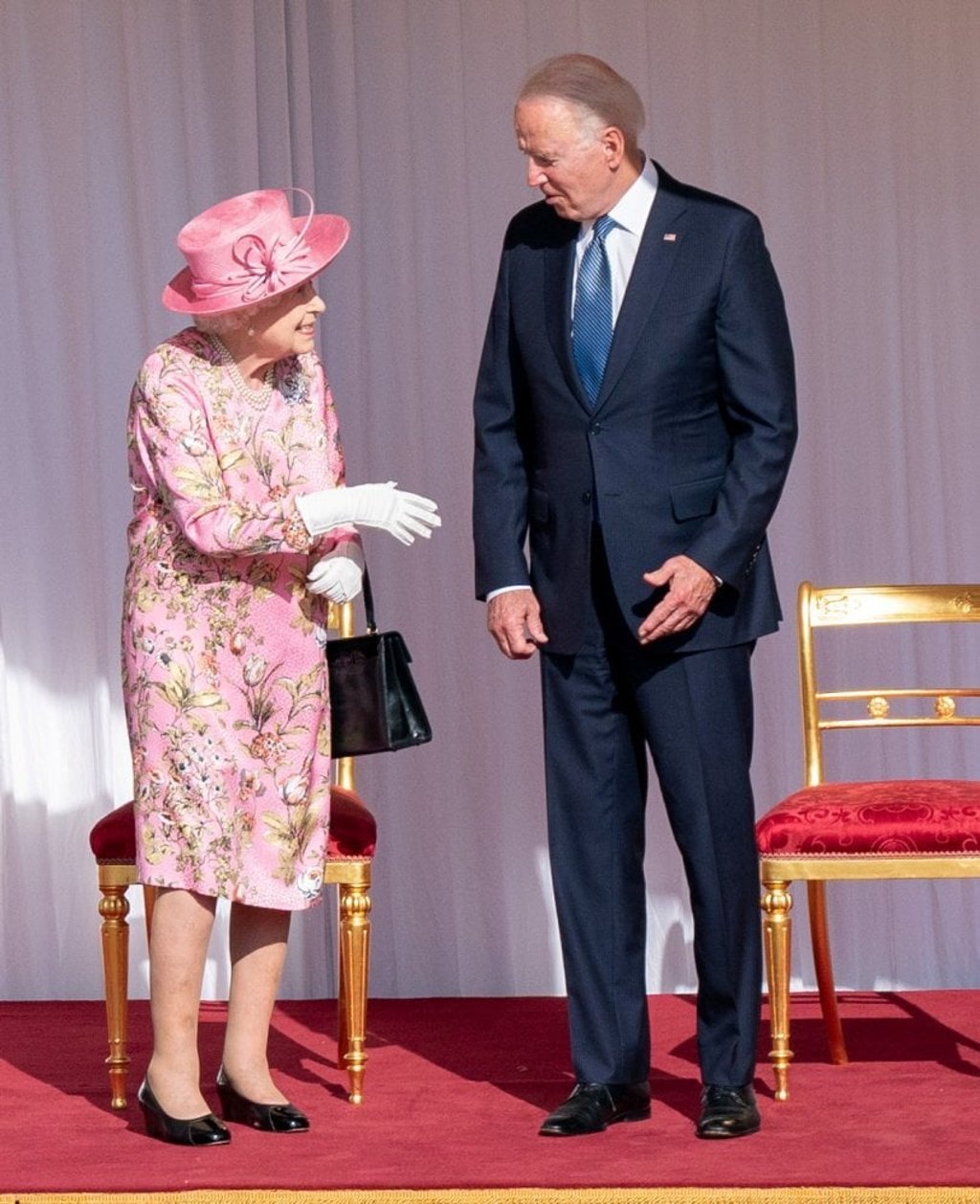 US President Joe Biden with Britain’s Queen Elizabeth as they met at Windsor Castle on June 13, 2021. Photo: Pool via Reuters
