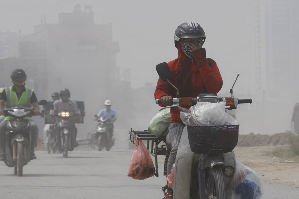 Motorcyclists in Hanoi, Vietnam, which suffers some of the world’s worst air pollution. Photo: EPA Motorcyclists in Hanoi, Vietnam, which suffers some of the world’s worst air pollution. Photo: EPA