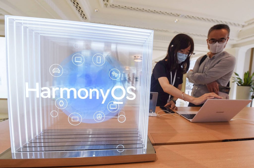 Shoppers try out products running the HarmonyOS mobile platform at a Huawei Technologies Co store in Shanghai on June 3, 2021. Photo: Agence France-Presse