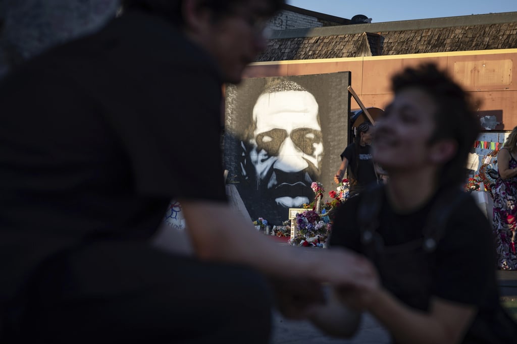 Community members gather in George Floyd Square in Minneapolis, Minnesota. Photo: AP Community members gather in George Floyd Square in Minneapolis, Minnesota. Photo: AP