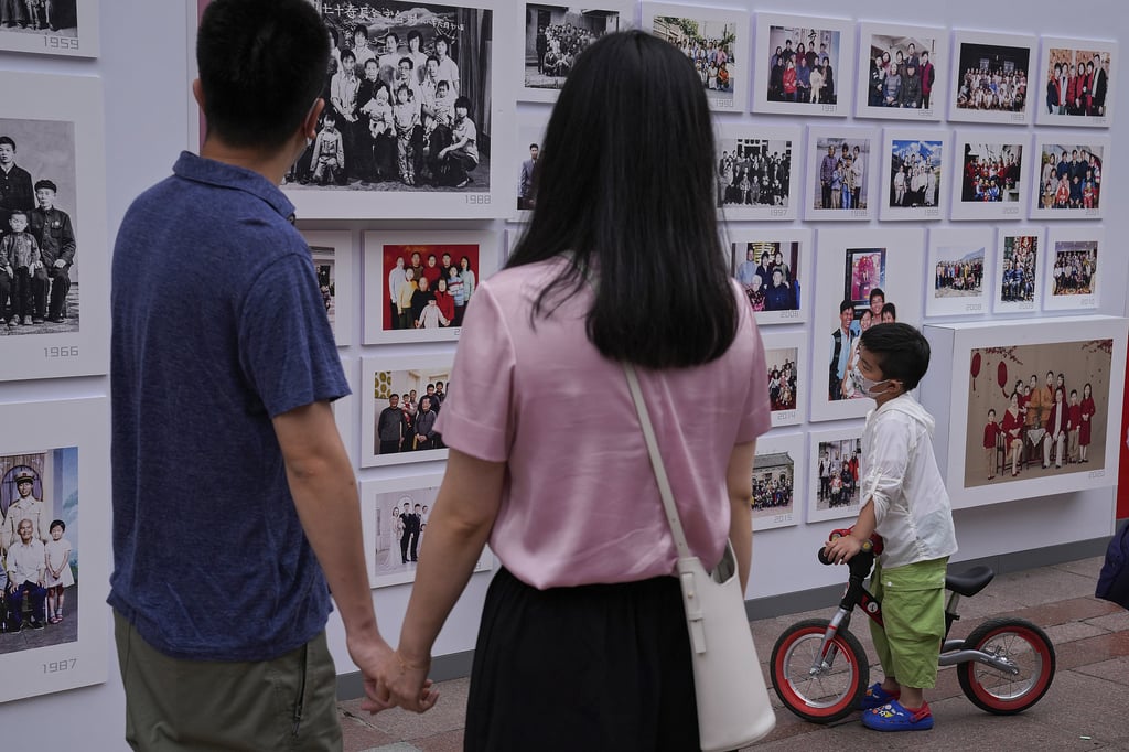 A photo exhibition in Beijing held to mark the Communist Party’s centenary anniversary attracts onlookers on June 14. The Communist Party’s mission is to seek happiness for the Chinese people and rejuvenation for the nation. Photo: AP A photo exhibition in Beijing held to mark the Communist Party’s centenary anniversary attracts onlookers on June 14. The Communist Party’s mission is to seek happiness for the Chinese people and rejuvenation for the nation. Photo: AP