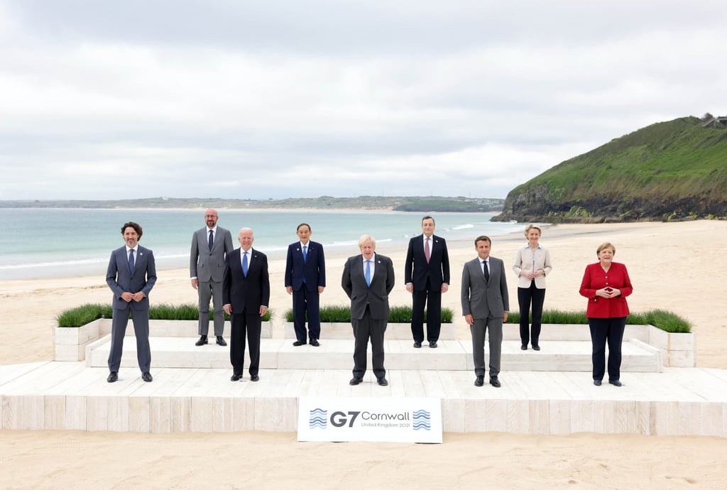 Leaders pose for a group photo at the G7 meeting in Britain on June 11. Photo: Xinhua Leaders pose for a group photo at the G7 meeting in Britain on June 11. Photo: Xinhua