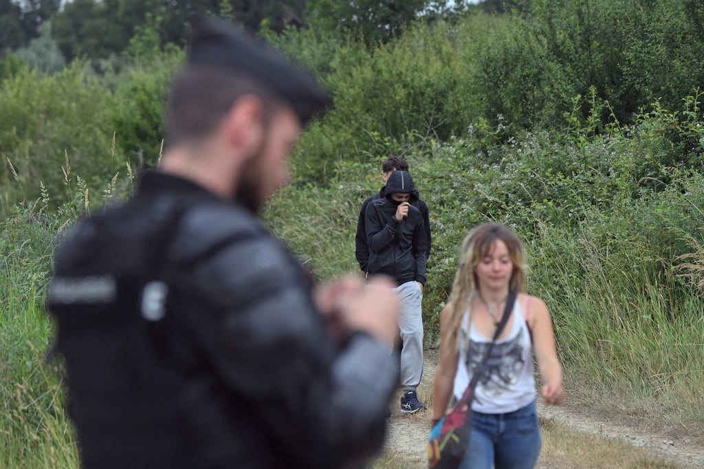 Partygoers at an illegal rave party in a field in Redon, northwestern France, on Saturday. Photo: AFP Partygoers at an illegal rave party in a field in Redon, northwestern France, on Saturday. Photo: AFP