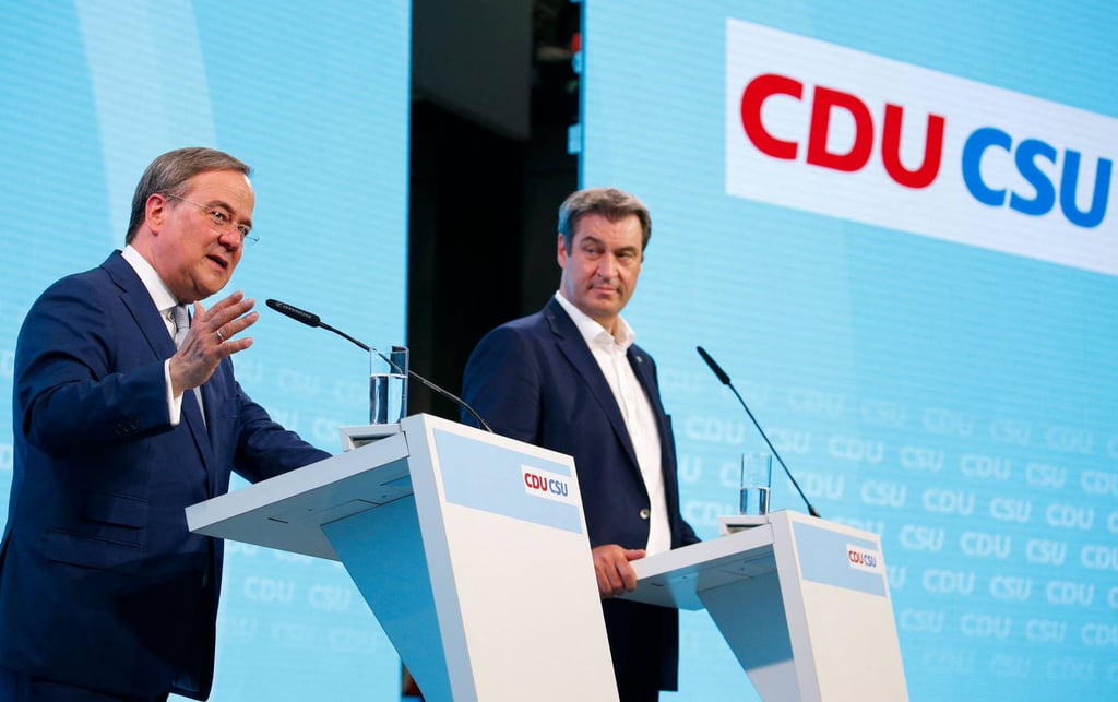 Christian Democratic Union (CDU) leader Armin Laschet and Christian Social Union (CSU) leader Markus Söder give a press conference after a congress of the conservative CDU/CSU sister parties in Berlin, Germany on Monday. Photo: AFP Christian Democratic Union (CDU) leader Armin Laschet and Christian Social Union (CSU) leader Markus Söder give a press conference after a congress of the conservative CDU/CSU sister parties in Berlin, Germany on Monday. Photo: AFP