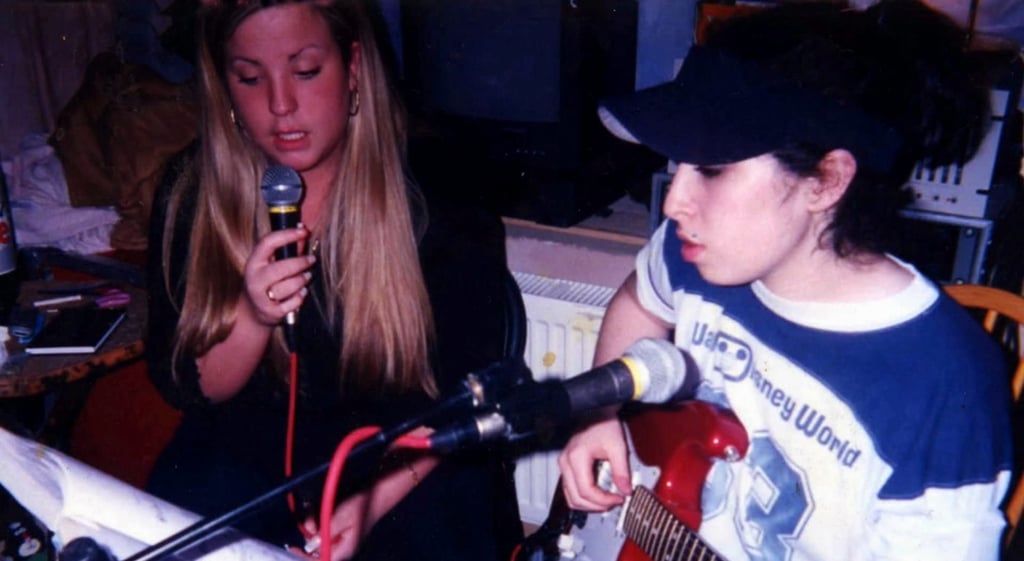 A young Winehouse on the guitar. Photo: Amy Winehouse family