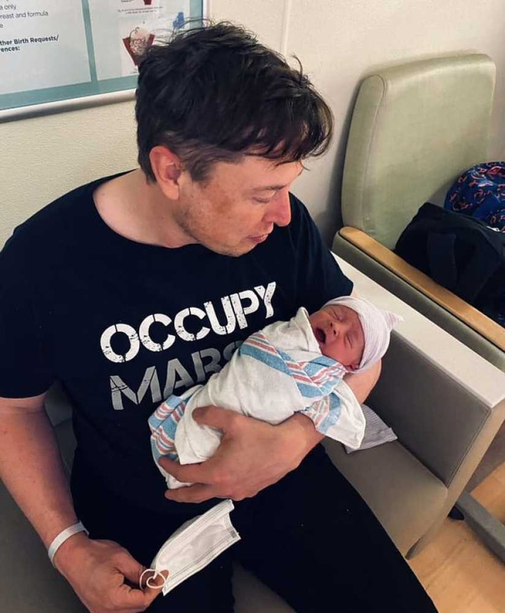 Elon Musk and his baby, whose name is apparently pronounced “Kyle”. Photo: @elonmusk/Instagram