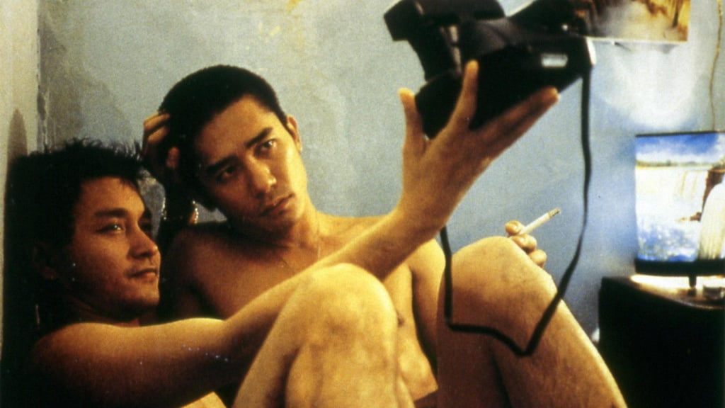 Leslie Cheung and Tony Leung Chiu-wai get cosy in iconic LGBTQ+ film Happy Together. Photo: SCMP Archive