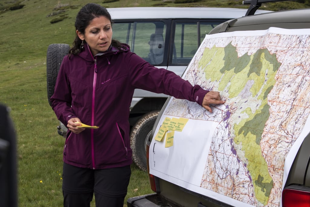 Anela Stavrevska-Panajotova of the International Union for Conservation of Nature shows a map of the new national park during a press briefing on Shar Mountain, North Macedonia, on June 9, 2021. Photo: EPA-EFE