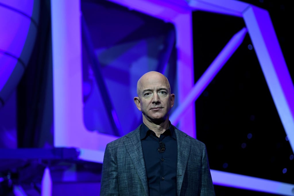 Founder and former chairman, CEO and president of Amazon Jeff Bezos unveils his space company Blue Origin’s space exploration lunar lander rocket called Blue Moon during an event in Washington, in May 2019. Photo: Reuters