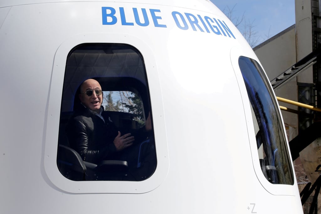 Amazon and Blue Origin founder Jeff Bezos addresses the media about the New Shepard rocket booster and Crew Capsule mock-up at the 33rd Space Symposium in Colorado Springs, Colorado, in April 2017. Photo: Reuters