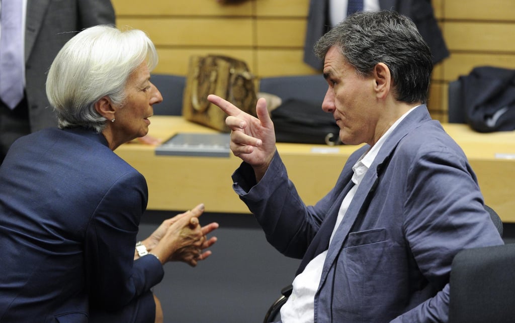 Christine Lagarde (left), then managing director of the International Monetary Fund, and Euclid Tsakalotos, then Greece’s finance minister, talk at the start of a special Euro group finance ministers’ meeting on the Greek crisis, at the European Council headquarters in Brussels, Belgium, on July 12, 2015. Euro zone finance ministers had set the day as the deadline to reach an agreement to save Greece from bankruptcy, amid warnings that failure to strike a deal by then could lead the country to crash out of the zone. Photo: EPA Christine Lagarde (left), then managing director of the International Monetary Fund, and Euclid Tsakalotos, then Greece’s finance minister, talk at the start of a special Euro group finance ministers’ meeting on the Greek crisis, at the European Council headquarters in Brussels, Belgium, on July 12, 2015. Euro zone finance ministers had set the day as the deadline to reach an agreement to save Greece from bankruptcy, amid warnings that failure to strike a deal by then could lead the country to crash out of the zone. Photo: EPA