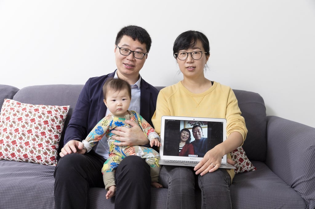 Hou with his wife Haiqin Li and son Baoxi at their home in Sydney. Photo: The University of Sydney / Louise M Cooper