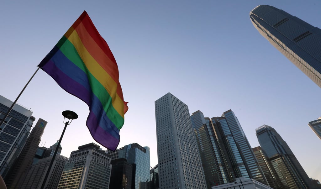 A rainbow flag is held aloft at the 2019 Pride Parade assembly in Central, Hong Kong, on November 16, 2019. While the Bill of Rights protects the LGBT community in Hong Kong’s public sector from discrimination on the grounds of sexual orientation, employees of private firms can still be fired due to their sexual orientation. Photo: Felix Wong A rainbow flag is held aloft at the 2019 Pride Parade assembly in Central, Hong Kong, on November 16, 2019. While the Bill of Rights protects the LGBT community in Hong Kong’s public sector from discrimination on the grounds of sexual orientation, employees of private firms can still be fired due to their sexual orientation. Photo: Felix Wong