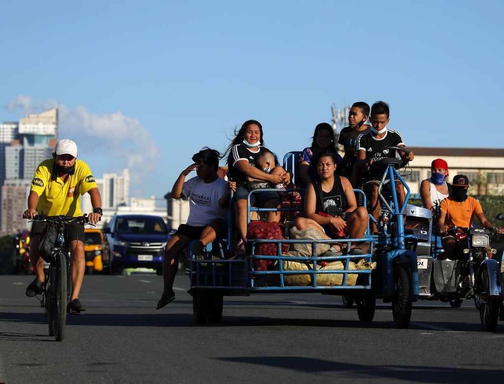 Motorists in Manila, the Philippines. Photo: EPA Motorists in Manila, the Philippines. Photo: EPA
