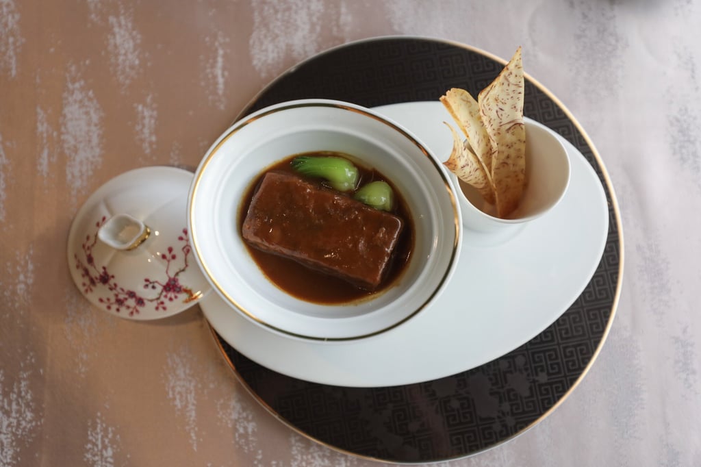 Braised pork belly and taro at Man Wah, Mandarin Oriental. Photo: Xiaomei Chen Braised pork belly and taro at Man Wah, Mandarin Oriental. Photo: Xiaomei Chen