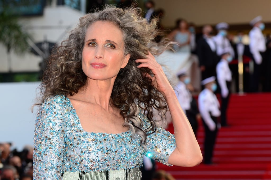 Andie MacDowell wears a satin dress embellished with a bodice embroidered with aquamarine crystals and glass fringes from Prada as she arrives for the festival’s opening ceremony. Photo: EPA-EFE Andie MacDowell wears a satin dress embellished with a bodice embroidered with aquamarine crystals and glass fringes from Prada as she arrives for the festival’s opening ceremony. Photo: EPA-EFE