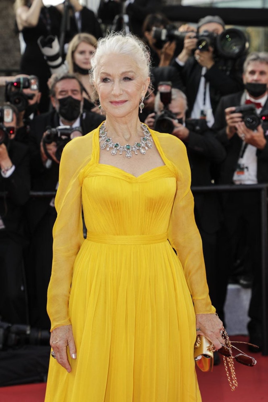 Helen Mirren wears a Dolce & Gabbana silk chiffon gown in yellow as she arrives for the festival’s opening ceremony. Photo: Vianney Le Caer/Invision/AP Helen Mirren wears a Dolce & Gabbana silk chiffon gown in yellow as she arrives for the festival’s opening ceremony. Photo: Vianney Le Caer/Invision/AP