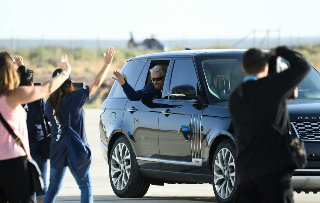 British billionaire Richard Branson waves as he arrives at Spaceport America, near Truth or Consequences, New Mexico, on July 11, before travel to the cosmos. Photo: AFP