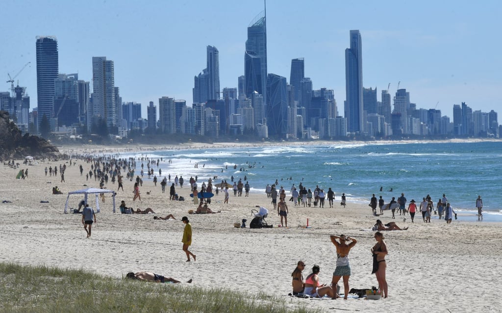 People on the beach at Burleigh Heads on the Gold Coast, Queensland, in May 2020. Photo: EPA-EFE People on the beach at Burleigh Heads on the Gold Coast, Queensland, in May 2020. Photo: EPA-EFE