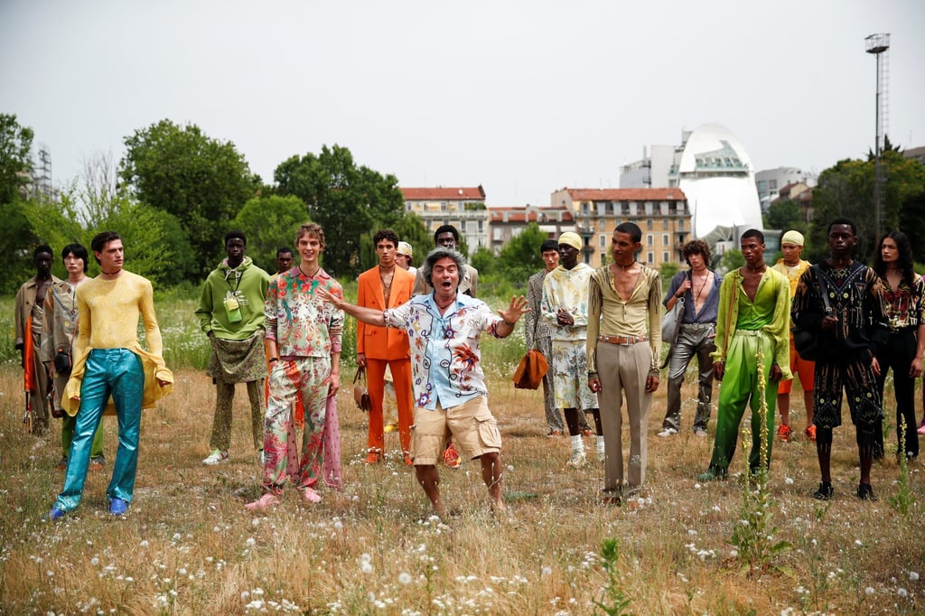 Designer Kean Etro poses with models from the Etro spring/summer 2022 men’s collection during Fashion Week in Milan, Italy, on June 20, 2021. Photo: Reuters