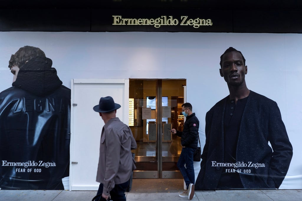 Plywood covers the windows of an Ermenegildo Zegna store in Chicago, Illinois, US, in October 2020. Photo: Reuters