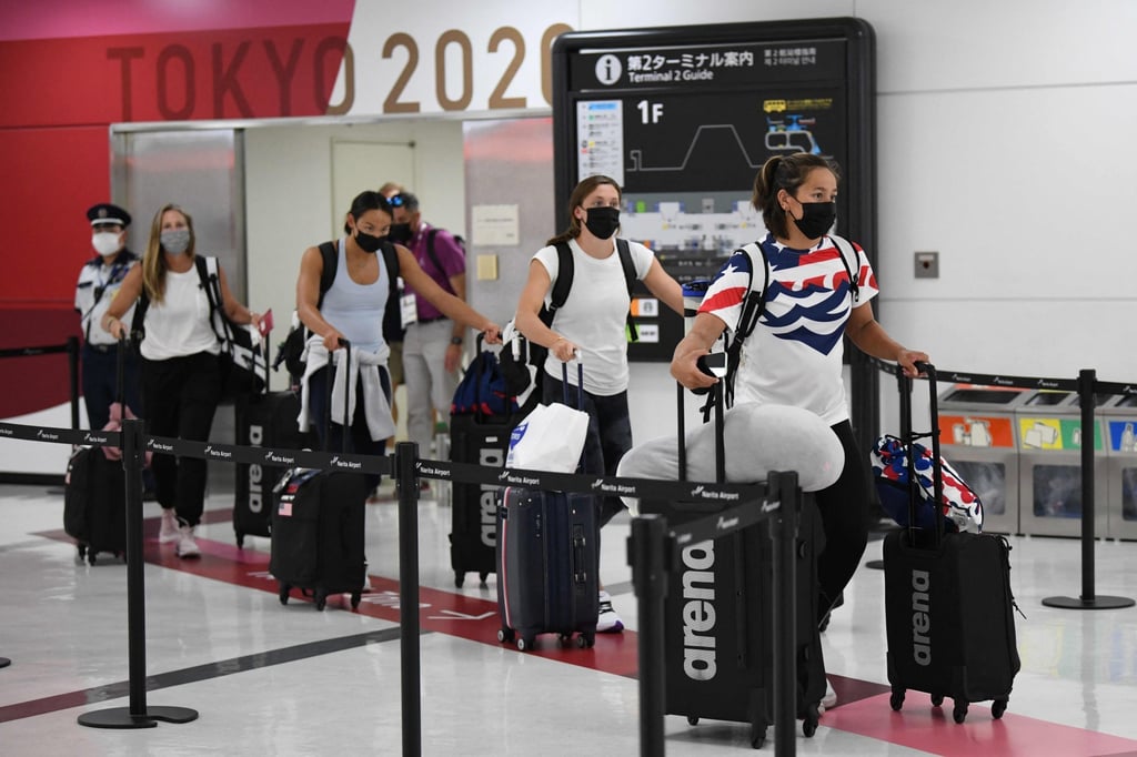 Members of the US swimming team arrive for the Tokyo 2020 Olympic Games at Japan’s Narita International Airport on July 14, 2021. Photo: AFP