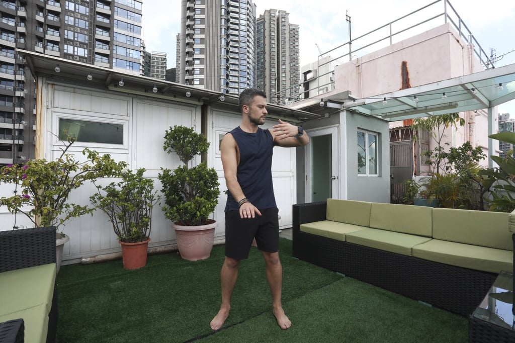Moutafis practising qigong on his rooftop at his home. Photo: Jonathan Wong Moutafis practising qigong on his rooftop at his home. Photo: Jonathan Wong