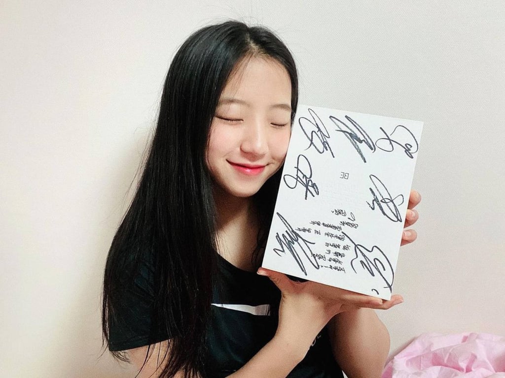 Shin Yu-bin received a signed album from the BTS members recently. Photo: @shin_yubin_/Instagram
