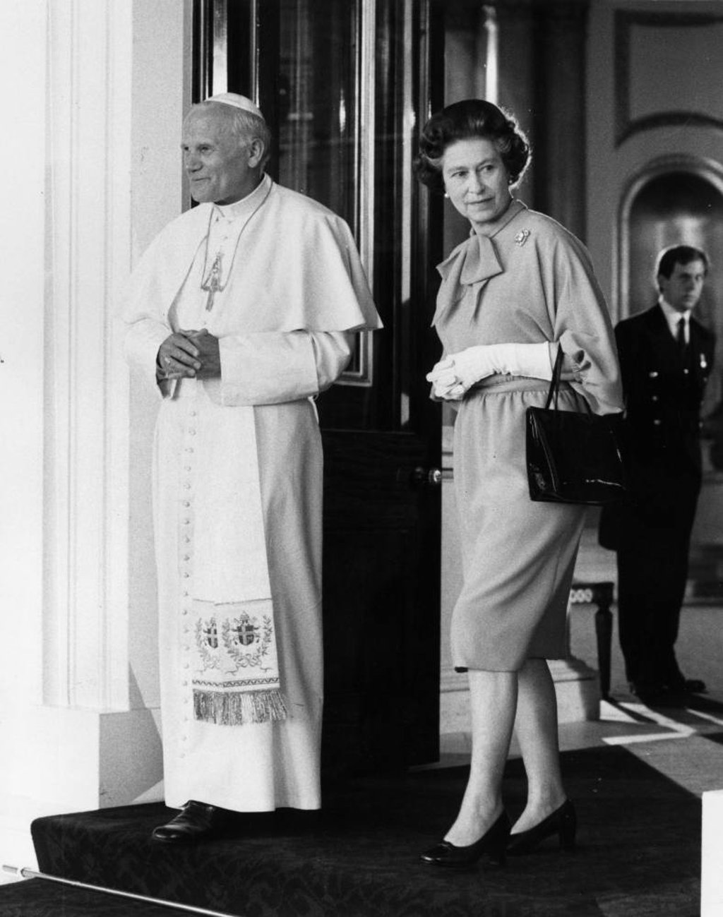 Queen Elizabeth and Pope John Paul II inside Buckingham Palace – royal engagements often mean being on your feet all day. Photo: Getty Images
