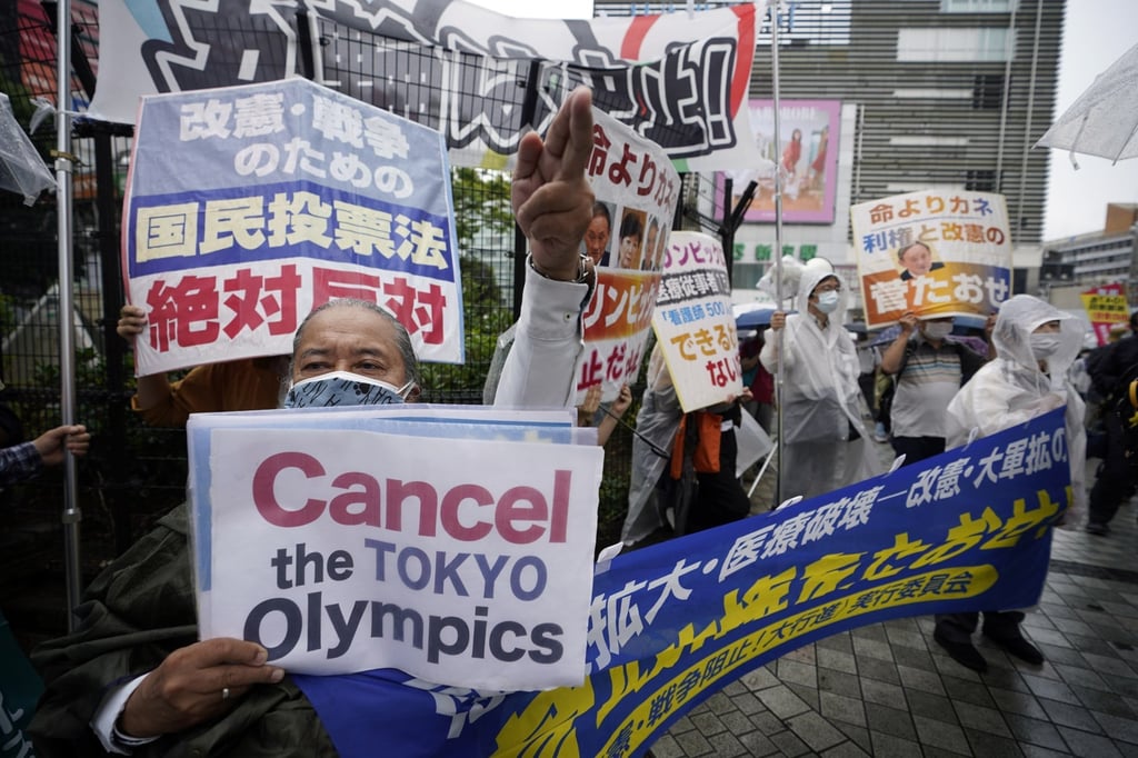 Protesters shout slogans during a rally against the Olympic Games in Tokyo on June 6. Photo: EPA-EFE