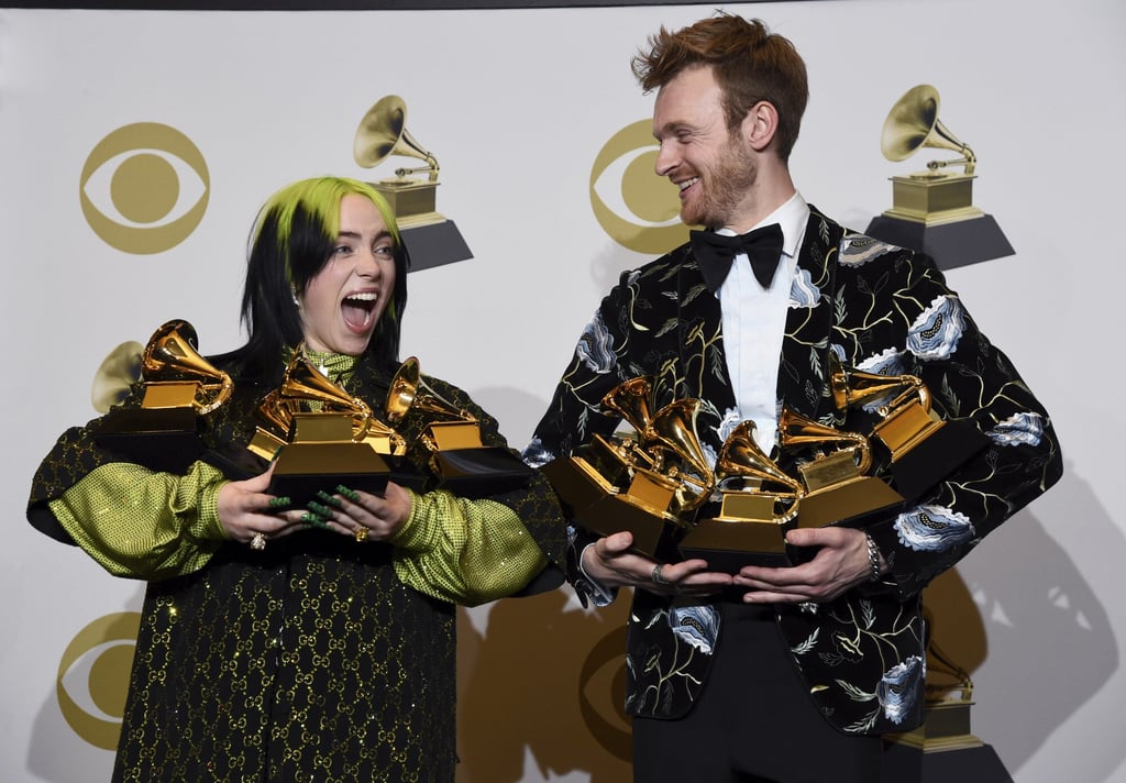 Billie Eilish, left, and Finneas O’Connell pose in the press room with the awards for best album, best engineered album and best pop vocal album for “We All Fall Asleep, Where Do We Go?,” best song and record for Bad Guy, best new artist and best producer, non-classical at the 62nd annual Grammy Awards in Los Angeles, in January 2020. Photo: AP Photo