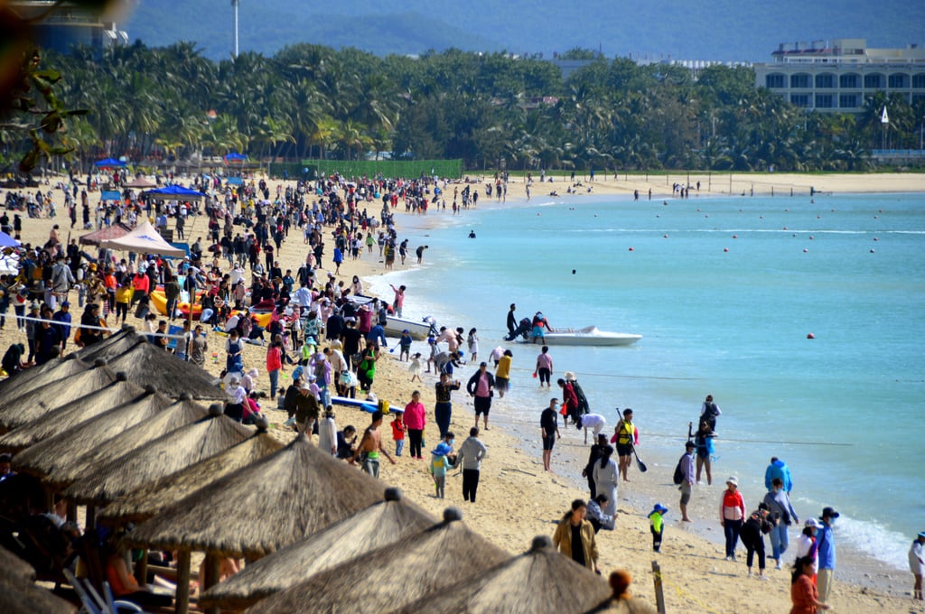 Tourists at a beach in Sanya, Hainan province, on January 1. Photo: Getty Images Tourists at a beach in Sanya, Hainan province, on January 1. Photo: Getty Images