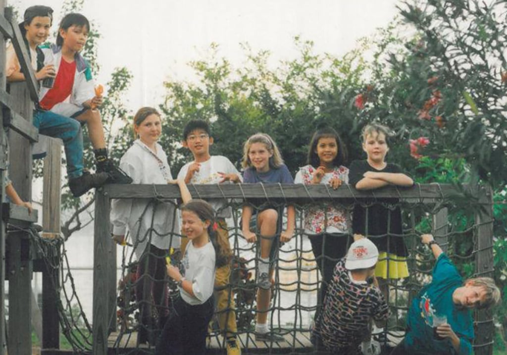 Liu as a child, (fourth right), standing. When she returned to Canada to go to boarding school, she “absolutely hated it”. Photo: Vivien Liu Liu as a child, (fourth right), standing. When she returned to Canada to go to boarding school, she “absolutely hated it”. Photo: Vivien Liu