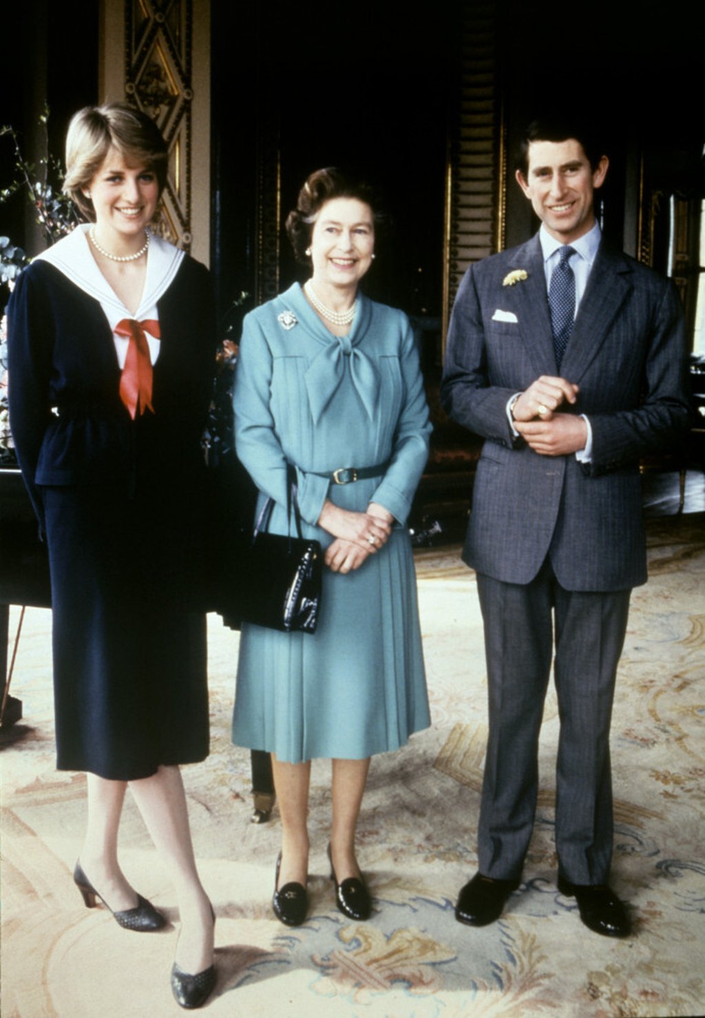 Queen Elizabeth poses with her son, Prince Charles, and his then-fiancée, Lady Diana Spencer, at Buckingham Palace in March 1981. Photo: AFP