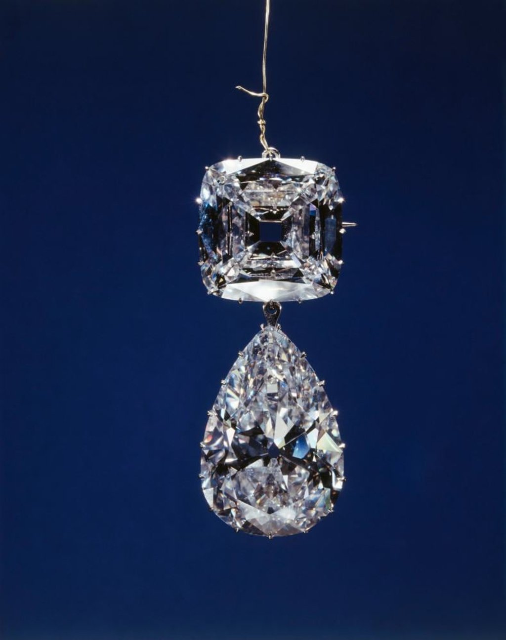 The Cullinan III and IV Brooch by Joseph Asscher and Co., made from a pear-shaped diamond of 94.4 metric carats and a cushion-shaped stone of 63.6 carats in 1911. Photo: Royal Collection Trust The Cullinan III and IV Brooch by Joseph Asscher and Co., made from a pear-shaped diamond of 94.4 metric carats and a cushion-shaped stone of 63.6 carats in 1911. Photo: Royal Collection Trust